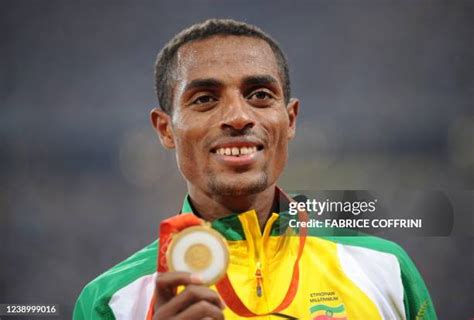  Kissing for Change: Kenenisa Bekele Sparks Controversy with On-Stage Affection!